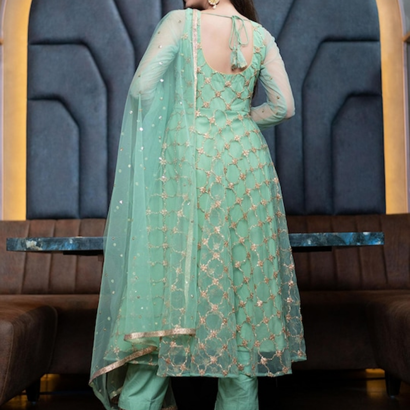 Green and gold-toned semi-stitched dress material 
